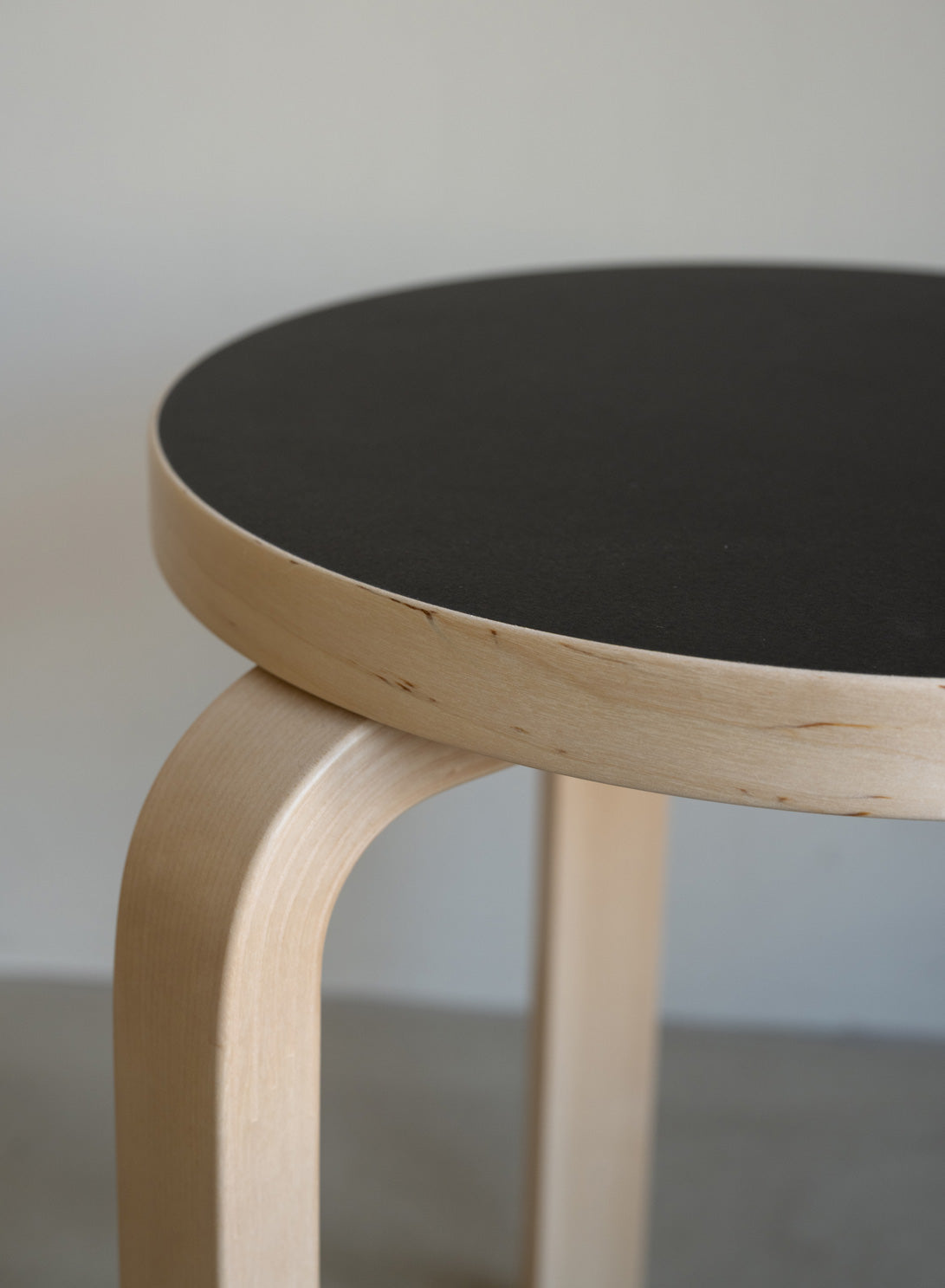 Stool 60, Legs Birch, Seat Linoleum Black - Artek